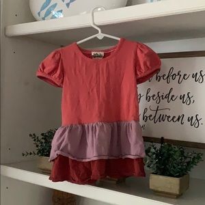 A MJ, soft, ruffle shirt.